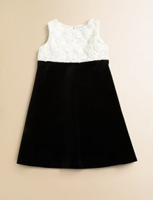 This lovely party frock combines a feminine tulle top with swirled rosettes and a graceful A-line velvet skirt for a look that's both sweet and sophisticated.Round necklineSleevelessEmpire waistA-line skirtBack keyhole tie and zip closeFully linedCottonMachine washImported This lovely party frock combines a feminine tulle top with swirled rosettes and a graceful A-line velvet skirt for a look that's both sweet and sophisticated.Round necklineSleevelessEmpire waistA-line skirtBack keyhole tie and zip closeFully linedCottonMachine washImported