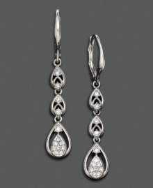 These open-leaf earrings by Eliot Danori ramp up the style for your extra-special look. In crystal accents and silvertone mixed metal. Approximate length: 2 inches. These open-leaf earrings by Eliot Danori ramp up the style for your extra-special look. In crystal accents and silvertone mixed metal. Approximate length: 2 inches.