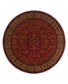 A larger-diameter round that is ideal for open spaces, this rug is a modern classic. Fashioned using the most advanced method available for heat-set polypropylene, the Everest Isfahan collection offers a contemporary dance of crimson symmetry, and refined style. Field features intricate floral motif set against a rich, red background, and an elaborate, courtly border. Super-dense power-loom weave creates a natural appearance without sacrificing the soft luxury finish of hand-woven rugs. One-year limited warranty (defects due to manufacturing).