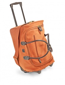 THE LOOKTwo-wheel duffelLeather double top handlesRemovable, adjustable webbed cotton shoulder strapRetractable locking handleRemovable luggage tagTop zip closureOne outside zip pocketTwo protective bottom feetOne inside zip pocketTHE MEASUREMENTDouble top handles, 10 dropAdjustable shoulder strap, 12-23 dropLocking handle, 23 drop21W X 13H X 10DTHE MATERIALPVCLeather trimFully linedORIGINImported