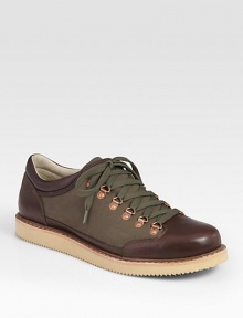 The perfect blend of rugged durability and undeniable style, carefully constructed in premium leather and canvas with contrasting rubber sole.Leather/canvas upperLeather liningPadded insoleRubber soleImported The perfect blend of rugged durability and undeniable style, carefully constructed in premium leather and canvas with contrasting rubber sole.Leather/canvas upperLeather liningPadded insoleRubber soleImported