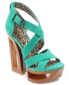 Bold and fun. Jessica Simpson's Thunder suede sandals feature a cutout platform that's so eye-catching and cool.