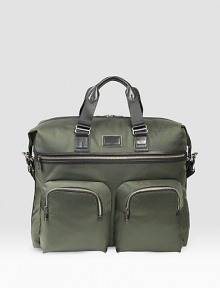 A soft, carry-on size duffel ideal for overnight or weekend travel in soft, high-performance ballistic nylon with a roomy interior and an array of organizer pockets. Leather top handles Adjustable, detachable shoulder strap Zip closure Front and back zip pockets Interior zip, slip pockets 19½W X 15H X 8D Imported A soft, carry-on size duffel ideal for overnight or weekend travel in soft, high-performance ballistic nylon with a roomy interior and an array of organizer pockets. Leather top handles Adjustable, detachable shoulder strap Zip closure Front and back zip pockets Interior zip, slip pockets 19½W X 15H X 8D Imported