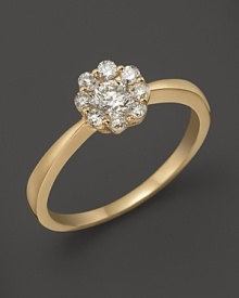 Faceted diamonds in 14K yellow gold flower setting.