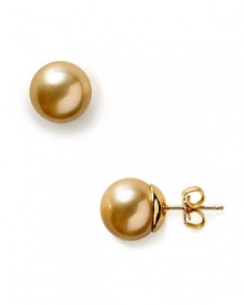 Majorica 12mm round champagne pearl stud earrings are beautifully crafted using organic man made pearls from Mallorca, Spain. Sterling silver and 14 karat post for pierced ears. Majorica 12mm round champagne pearl stud earrings are beautifully crafted using organic man made pearls from Mallorca, Spain. Sterling silver and 14 karat post for pierced ears.
