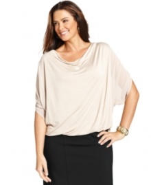 Elegant draping beautifully highlights Alfani's dolman sleeve plus size top, finished by a bubble hem.