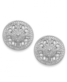 Versatile style. A must-have for any woman's jewelry collection, Eliot Danori's crystal stud earrings shine brightly whether you wear them for work or weekends. Set in silver tone mixed metal. Approximate diameter: 3/4 inch.