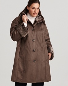 Warm up to the cold weather in this Portrait A-line walking coat, rendered in faux shearling with plush faux-fur trim at the collar and cuffs. Warm up to the cold weather in this Portrait A-line walking coat, rendered in faux shearling with plush faux-fur trim at the collar and cuffs.