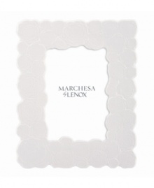 Cherish memories with the fresh and chic Marchesa Rose picture frame. White bone china sculpted with blooms inspired by the designer's couture gowns infuse a room with modern romance. From Marchesa by Lenox.