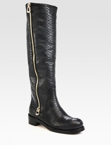 A long exposed zipper lines this tall silhouette, impeccably crafted of rich snake-embossed leather. Stacked heel, 1½ (40mm)Shaft, 16½Leg circumference, 14½Snake-embossed leather upperSide zipLeather liningRubber solePadded insoleMade in Italy