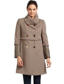THE LOOKConvertible collar with button closuresDouble-breasted button frontPintucked waist and sleevesLeather inset sleevesDual front seam pocketsTHE FITAbout 35 from shoulder to hemTHE MATERIALShell: wool/nylonTrim: leatherFully linedCARE & ORIGINDry clean by leather specialistImportedModel shown is 5'10 (177cm) wearing US size 4. THE LOOKConvertible collar with button closuresDouble-breasted button frontPintucked waist and sleevesLeather inset sleevesDual front seam pocketsTHE FITAbout 35 from shoulder to hemTHE MATERIALShell: wool/nylonTrim: leatherFully linedCARE & ORIGINDry clean by leather specialistImportedModel shown is 5'10 (177cm) wearing US size 4.