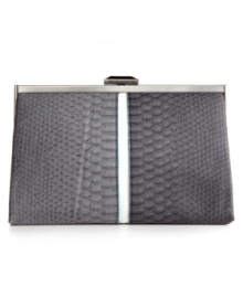 Add some downtown edge to your uptown ensemble with this embossed python print silhouette from RACHAEL by Rachael Roy. Contemporary colorblocking complements the classic silver-tone hardware, while the compact interior easily fits phone, cards, cash and lipstick. Add some downtown edge to your uptown ensemble with this embossed python print silhouette from RACHAEL by Rachael Roy. Contemporary colorblocking complements the classic silver-tone hardware, while the compact interior easily fits phone, cards, cash and lipstick.
