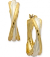 Stir up your style with these twisted oval hoop earrings from Charter Club. The two-tone style shines with unparalleled radiance. Crafted in gold and silver tone mixed metal. Approximate drop: 9/10 inch.