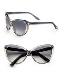 Striking cat's-eye design with a twisted bridge and logo-engraved lens in cool acetate. Available in shiny black with grey gradient lens or shiny blue with grey gradient lens.Logo temples100% UV protectionMade in Italy Striking cat's-eye design with a twisted bridge and logo-engraved lens in cool acetate. Available in shiny black with grey gradient lens or shiny blue with grey gradient lens.Logo temples100% UV protectionMade in Italy
