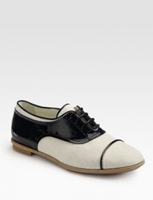 A classic oxford with a unique patent leather and canvas contrasting style. Patent leather and canvas upperLeather lining and solePadded insoleMade in ItalyOUR FIT MODEL RECOMMENDS ordering one half size up as this style runs small. A classic oxford with a unique patent leather and canvas contrasting style. Patent leather and canvas upperLeather lining and solePadded insoleMade in ItalyOUR FIT MODEL RECOMMENDS ordering one half size up as this style runs small.