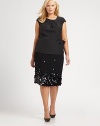 Brilliant palettes offer a confetti effect for this boucle skirt. Shaping darts offer you the fit of your dreams.Waist dartsConcealed back zipperFully linedAbout 25 longVirgin wool/polyamide/elastaneDry cleanImported of Italian fabric