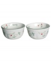 A festive companion to the holiday table, these sentimental Winterberry dessert bowls from Pfaltzgraff are adorned with a classic holly pattern, embossed detail and the words Harmony, Peace and Joy.