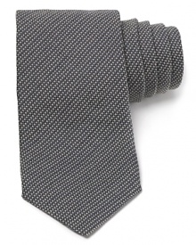 Carefully woven for a handsome check design, this premier tie from Armani Collezioni is made from lavish Italian silk for a luxurious addition to your wardrobe. Carefully woven for a handsome check design, this premier tie from Armani Collezioni is made from lavish Italian silk for a luxurious addition to your wardrobe.