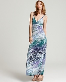 A dramatic maxi silhouette and multicolor abstract print elevates this twist-detailed strap Three Dots tank dress.