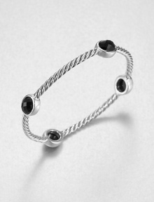 From the Renaissance Collection. Let this beautiful piece take you back in time with faceted black onyx stations on an iconic sterling silver cable design. Black onyxSterling silverDiameter, about 2.25Slip-on styleImported 