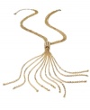 Whip your style into shape. Swishing chains in a lariat design pair with a crystal-accented station clasp to create a sleek look on this Alfani necklace. Set in 12k gold-plated mixed metal. Approximate length: 25 inches + 3-inch extender. Approximate drop: 7-1/2 inches.