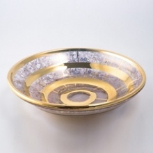 Michael Wainwright introduces glass gifts, stems and serveware with the with a glint of 24k gold and platinum. Michael Wainwright introduces glass gifts, stems and serveware with the with a glint of 24k gold and platinum.