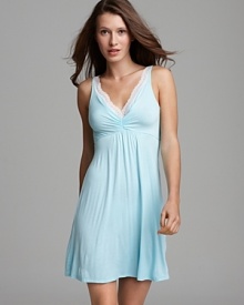 Be the epitome of elegance in this ruched neck chemise from Carole Hochman.