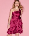 Take home the crown with Ruby Rox's one-shoulder plus size dress, flaunting a ruffled skirt.