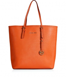 Sophisticated with simple, clean lines, MICHAEL Michael Kors textured leather tote is an elegant and versatile choice - Flat double top handles with buckle detail at base, metal logo on front, logo charm attached to handle, inside zippered back wall pocket, front wall slot pocket, cinch strap, strap with clip attached for keys - The perfect choice for work, school or running errands Sophisticated with simple, clean lines, MICHAEL Michael Kors textured leather tote is an elegant and versatile choice - Flat double top handles with buckle detail at base, metal logo on front, logo charm attached to handle, inside zippered back wall pocket, front wall slot pocket, cinch strap, strap with clip attached for keys - The perfect choice for work, school or running errands