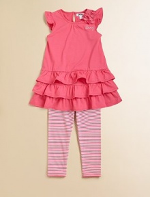 A comfy, lightweight set with a pretty ruffled tunic and adorable striped leggings. CrewneckRuffled cap sleevesDropped waist with tiered ruffle hemBack button closureElastic waistband57% cotton/38% polyester/5% spandex jerseyMachine washImported A comfy, lightweight set with a pretty ruffled tunic and adorable striped leggings. CrewneckRuffled cap sleevesDropped waist with tiered ruffle hemBack button closureElastic waistband57% cotton/38% polyester/5% spandex jerseyMachine washImported