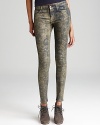 A golden floral print lends gilded luxe to these 7 For All Mankind skinny jeans.