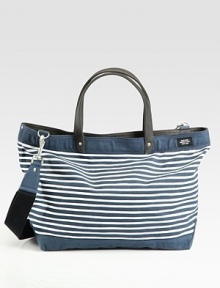 Constructed in durable waxed cotton and canvas, this rugged carryall is the perfect tote for your workday necessities or a trip to the gym.Double top handlesFlap with buckle closuresAdjustable shoulder strapInterior zip pocketWaxed cotton and canvas13¾W X 15½H X 6DImported Constructed in durable waxed cotton and canvas, this rugged carryall is the perfect tote for your workday necessities or a trip to the gym.Double top handlesFlap with buckle closuresAdjustable shoulder strapInterior zip pocketWaxed cotton and canvas13¾W X 15½H X 6DImported