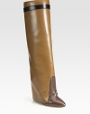 Sleek multicolored boot of supple leather, with a unique fold-over cuff and hidden lacquered wedge. Lacquered wedge with covered leather flap, 6 (150mm)Shaft, 19¾Leg circumference, 13½Leather upperPull-on styleLeather lining and solePadded insoleMade in Italy