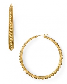 Tap this season's textured trend with this pair of hoop earrings from Carolee, featuring graduated beads for eye-catching shine.