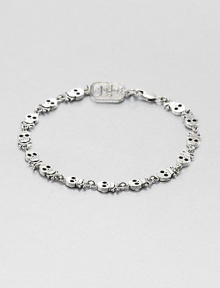 Incredibly defined skulls and crossbones are neatly designed in gleaming sterling silver for a rugged, yet refined approach to masculine, motif bracelet.Sterling silverDiameter, about 3Lobster claspMade in USA Incredibly defined skulls and crossbones are neatly designed in gleaming sterling silver for a rugged, yet refined approach to masculine, motif bracelet.Sterling silverDiameter, about 3Lobster claspMade in USA