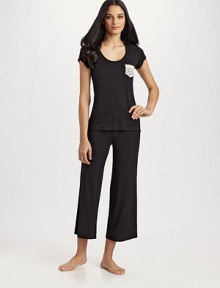 Lace details and a gathered back lend a feminine edge to a silhouette that's as stylish as it is comfy.Scoopneck Lace pocket Drawstring waist Inseam, about 25 95% modal/5% spandex Machine wash Imported Lace details and a gathered back lend a feminine edge to a silhouette that's as stylish as it is comfy.Scoopneck Lace pocket Drawstring waist Inseam, about 25 95% modal/5% spandex Machine wash Imported