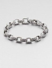 Sail away into a high-style with this medium oval-link bracelet finely crafted in superior sterling silver.Sterling silverAbout 9 diam.Imported