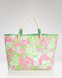 Start planning your tropical getaway with this Lilly Pulitzer tote, flaunting signature pink and green for a whimsical addition to your beach-chic style.