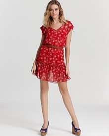 This Ella Moss dress works its feminine wiles with a dainty floral print and ruffled hem. A faux-leather braided belt finishes the look to summer perfection. This Ella Moss dress works its feminine wiles with a dainty floral print and ruffled hem. A faux-leather braided belt finishes the look to summer perfection.