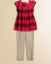 Large, colorful checks and a flared hem add to the allure of this tasteful knit.SquareneckShort sleevesBack button closurePintucked frontFlared hemCottonDry cleanImported Please note: Number of buttons may vary depending on size ordered. 