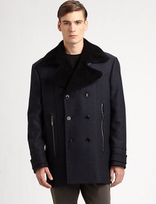 A sharp and innovative approach to a cold-weather staple, this double-breasted silhouette is woven in a rich, luxurious wool blend, resulting as the perfect choice for those brisk winter days.Button-frontZippered front pocketsRear ventAbout 33 from shoulder to hem80% wool/20% nylonDry cleanMade in Italy A sharp and innovative approach to a cold-weather staple, this double-breasted silhouette is woven in a rich, luxurious wool blend, resulting as the perfect choice for those brisk winter days.Button-frontZippered front pocketsRear ventAbout 33 from shoulder to hem80% wool/20% nylonDry cleanMade in Italy