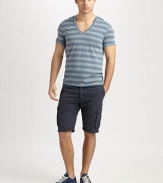 Contrasting stripes and an unfinished hem add some cool style to this comfortable v-neck design. V-neckShort sleevesUnfinished hemlineAbout 28 from shoulder to hem60% polyester/25% cotton/15% linenMachine washImported