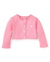 A cute button-front cardigan from Lilly Pulitzer with sweet scalloped trim.