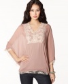 Floaty and feminine, this oversized Bar III chiffon top features lace & beading for a girly-vintage vibe!