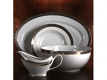 This exquisite formal collection is made from the finest Limoges porcelain. Adorned with ornate platinum accents and shimmering gold, it adds luxurious style to any table. This exquisite formal collection is made from the finest Limoges porcelain. Adorned with ornate platinum accents and shimmering gold, it adds luxurious style to any table.