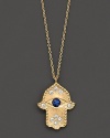 Sparkling diamonds and a sapphire eye watch over you. Set in 14K gold Hamsa pendant.