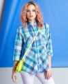 Fire updates the classic plaid button-down top with a soft-hued palette and empire-waist design.