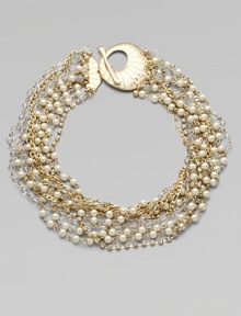 A dramatic statement, combining twisted strands of sparkling rhinestones, creamy glass pearls, faceted clear beads and golden chains into a striking piece.GlassGoldtoneLength, about 17Toggle closureImported A dramatic statement, combining twisted strands of sparkling rhinestones, creamy glass pearls, faceted clear beads and golden chains into a striking piece.GlassGoldtoneLength, about 17Toggle closureImported