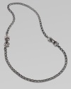 From the Jewels Verne Collection. A bold woven chain of sterling silver with a black rhodium finish has pretty filigree links with red garnet and goldplated accents.Red garnetBlack rhodium-plated sterling silver and rose goldplated sterling silverLength, about 26Imported