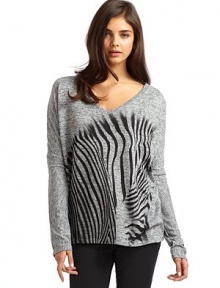 THE LOOKV-neckLong sleevesZebra graphicTHE FITAbout 27 from shoulder to longest part of hemTHE MATERIAL95% polyester/5% spandexCARE & ORIGINMachine washMade in USA